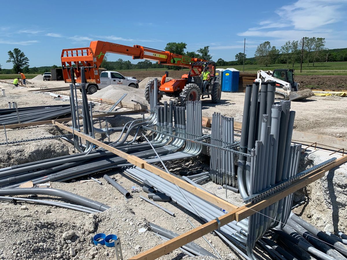 Underground conduit installation at Flora Farms